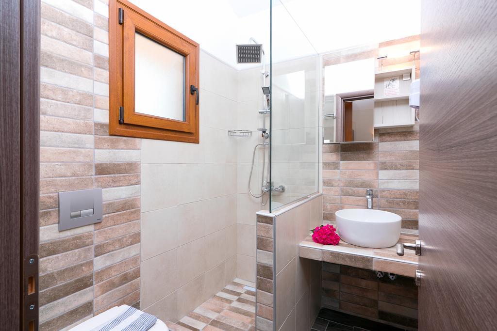 Kapsogeorgis Rooms Коинира Экстерьер фото